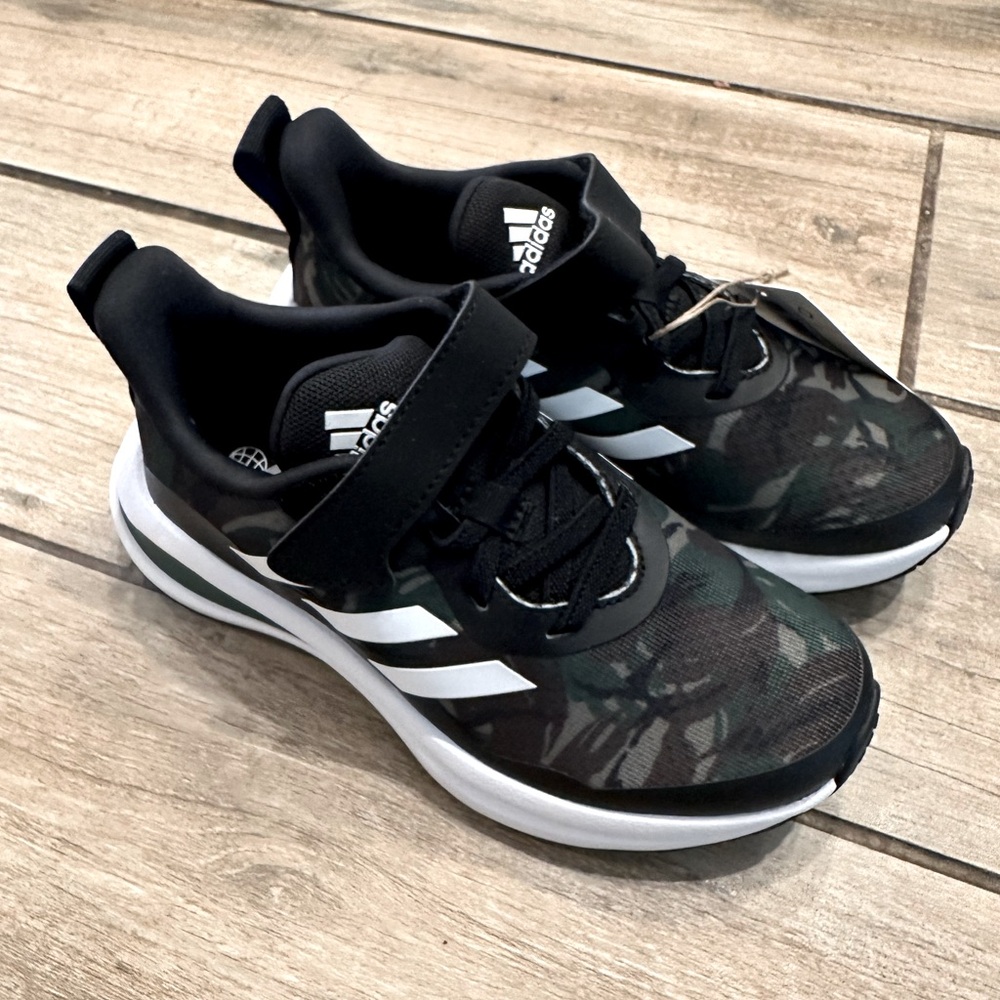 Never worn Boys Adidas shoes.